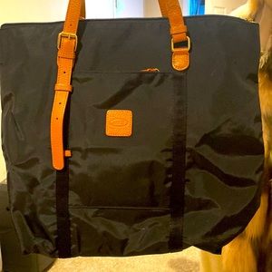 Brics Black Bag with detachable pouch and long strap.